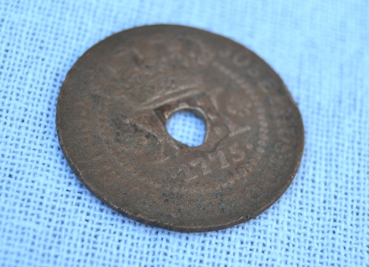 Moeda real da Coroa Portuguesa, 1775. Peça encontrada no sítio arqueológico da casa, já demolida, onde viveu Esperança Garcia