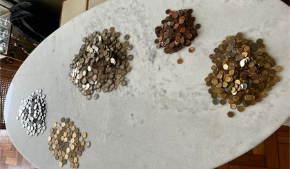 Moradora juntou mais de 1.600 moedas para pagar taxa de condomínio que custa R$ 835,00. (Foto: Arquivo Pessoal)